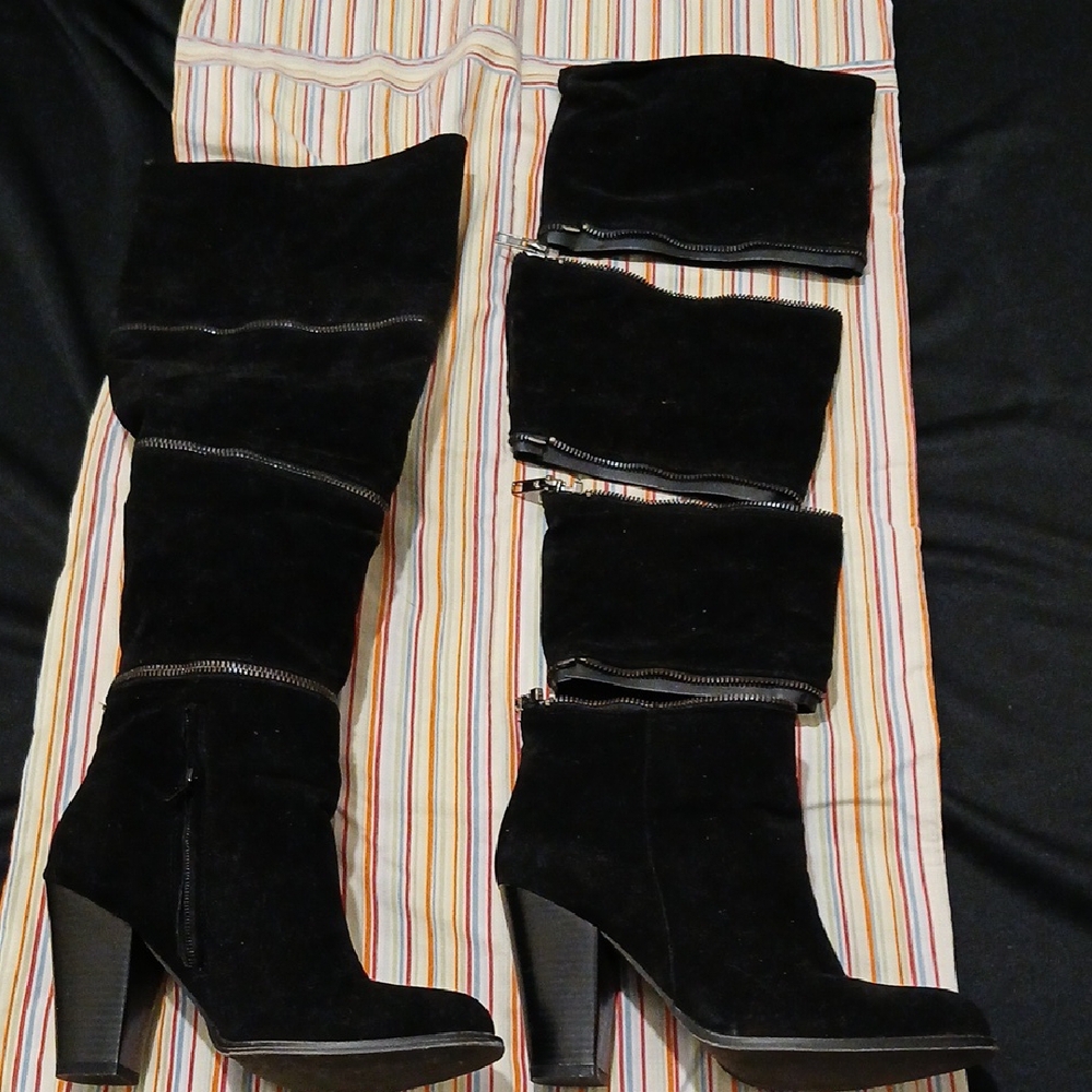 Sleek Black Heeled Boots with Segmented Design